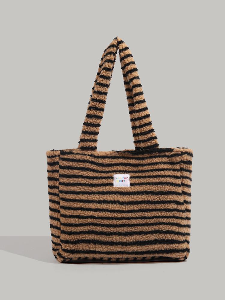 

Autumn and winter large-capacity fluffy bag women s 2025 new high-end commuting shoulder underarm bag striped plush tote bag хаки