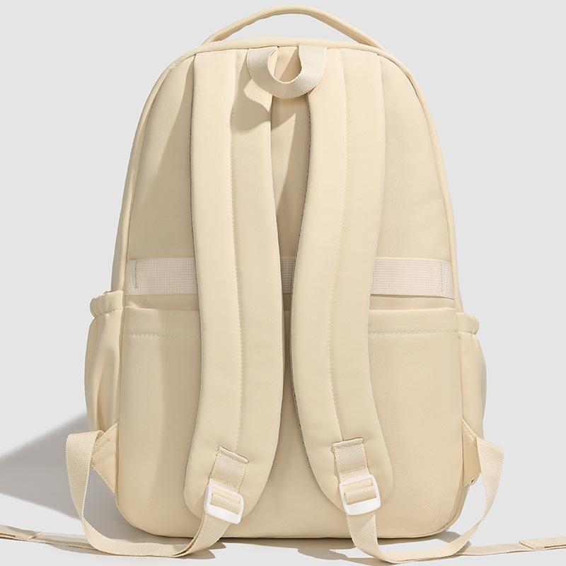 Elementary school bag Female junior high school student High school large capacity backpack Fashion high value Student burden reduction backpack