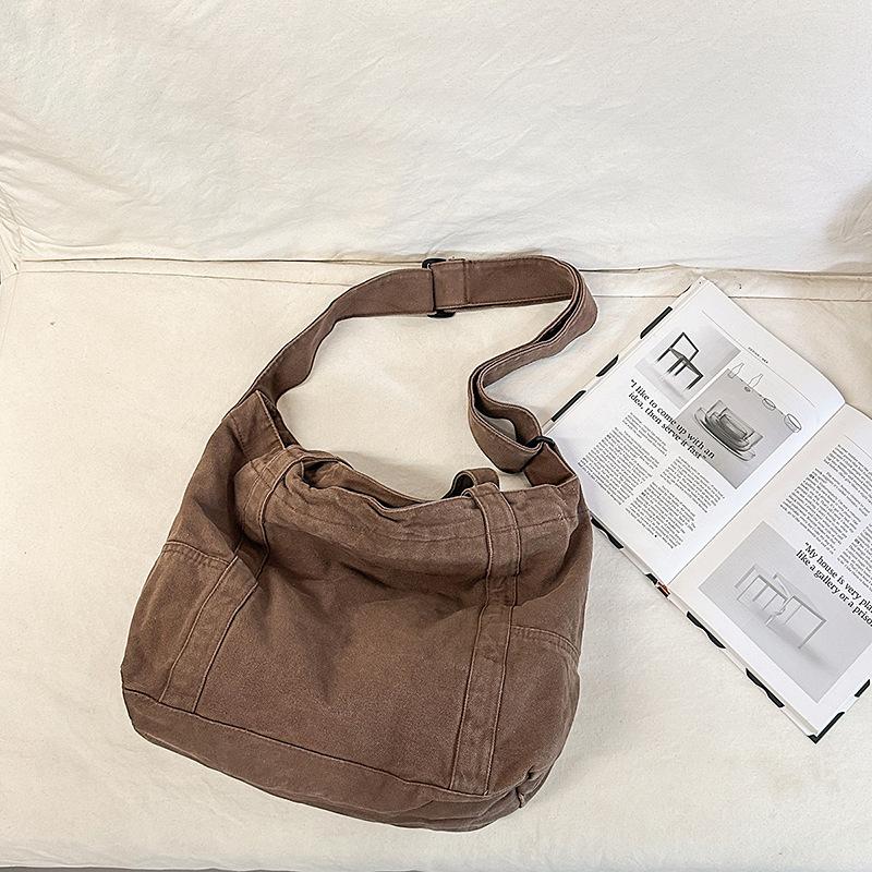 

2025 summer new large pocket portable tote bag versatile commuter large capacity high value single shoulder messenger bag коричневый