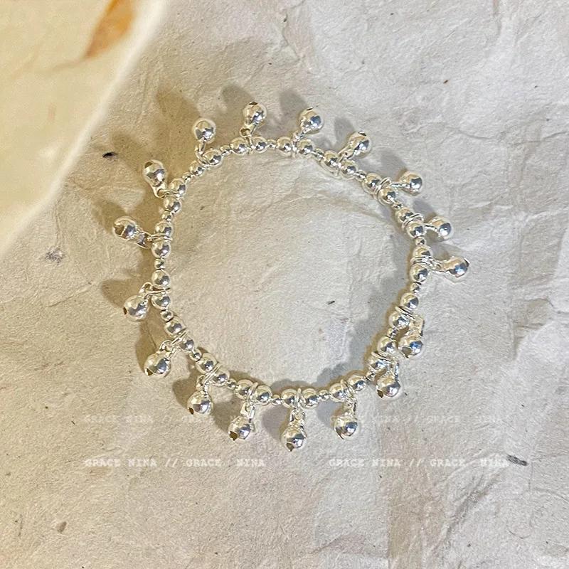 

Новий китайський вишуканий бамбуковий дзвіночок з персоналізованим геометричним браслетом для жінок