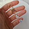Metal Keychain with Butterfly and Letter Pendant Elegant Design Durable Clasp Suitable for Keys and Accessories