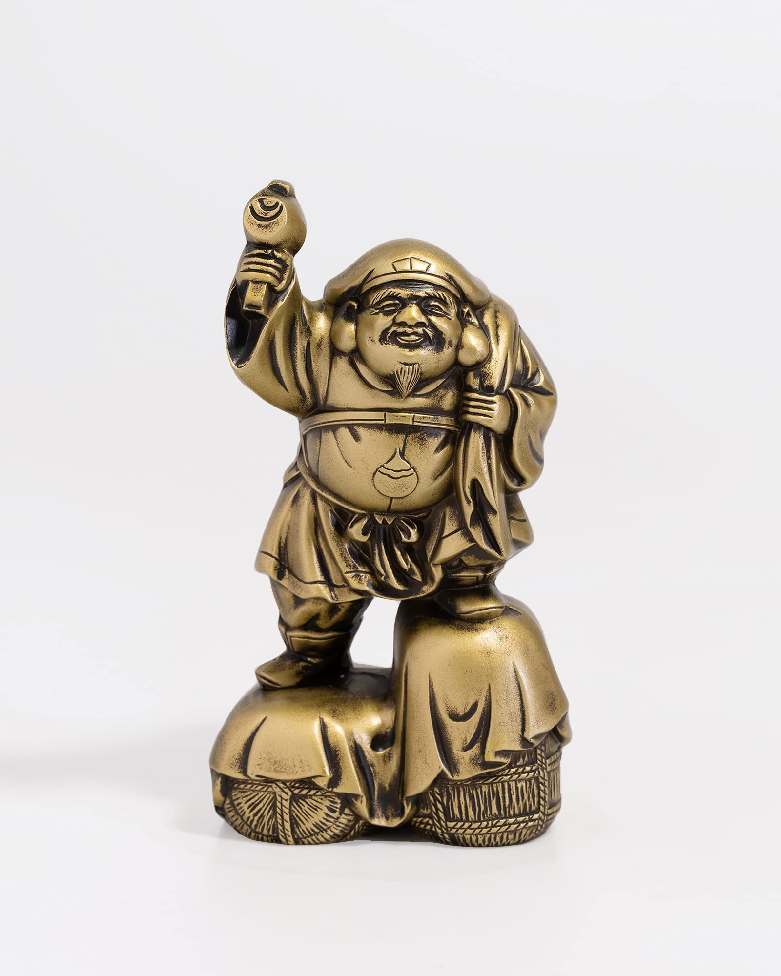 

Daikokuten, one of the Seven Lucky Gods, Silky Gold. Sculptor: Makita Shuun. Original: Antique Gold. Buddhist statue. Takaoka Copperware (Daikokuten