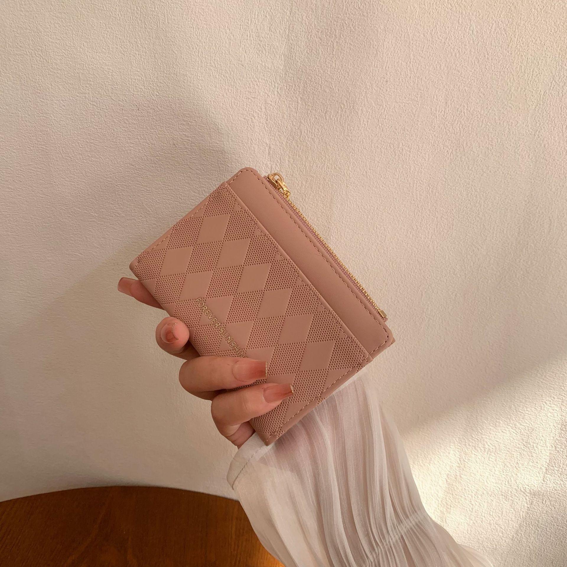 

New stylish and simple ins women s change bag premium leather special leather prismatic printing small wallet women рожевий