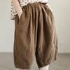 Pantaloni semplici casual da donna estivi in cotone e lino retrò letterario a tinta unita con elastico in vita taglia grande pantaloni a cinque punti