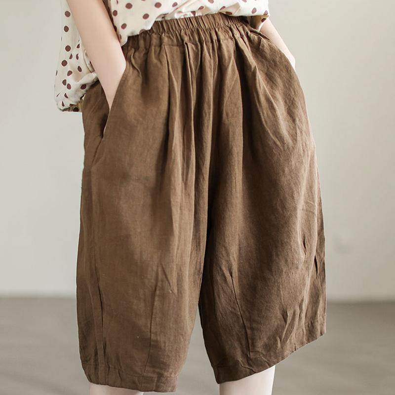 Pantaloni semplici casual da donna estivi in cotone e lino retrò letterario a tinta unita con elastico in vita taglia grande pantaloni a cinque punti