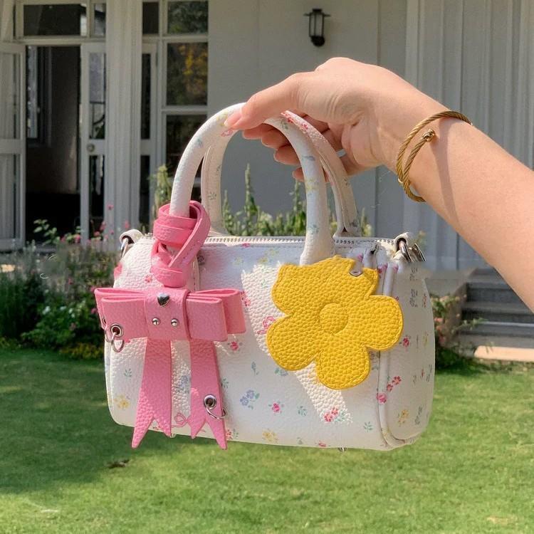 

Bag women s niche high-end cute design sense white this year s popular versatile light luxury messenger bag bow bag белый