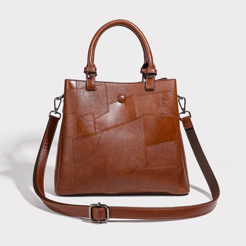 Guangzhou women's bucket bag 2026 new fashion versatile large-capacity commuter bag niche single-shoulder crossbody tote bag