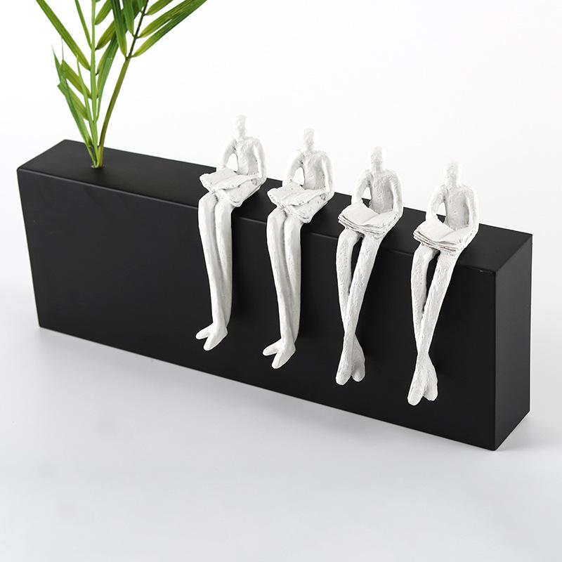 Simple Modern Side By Side Sitting and Reading Character Combination Decoration Sample Room Living Room TV Cabinet Creative Decoration