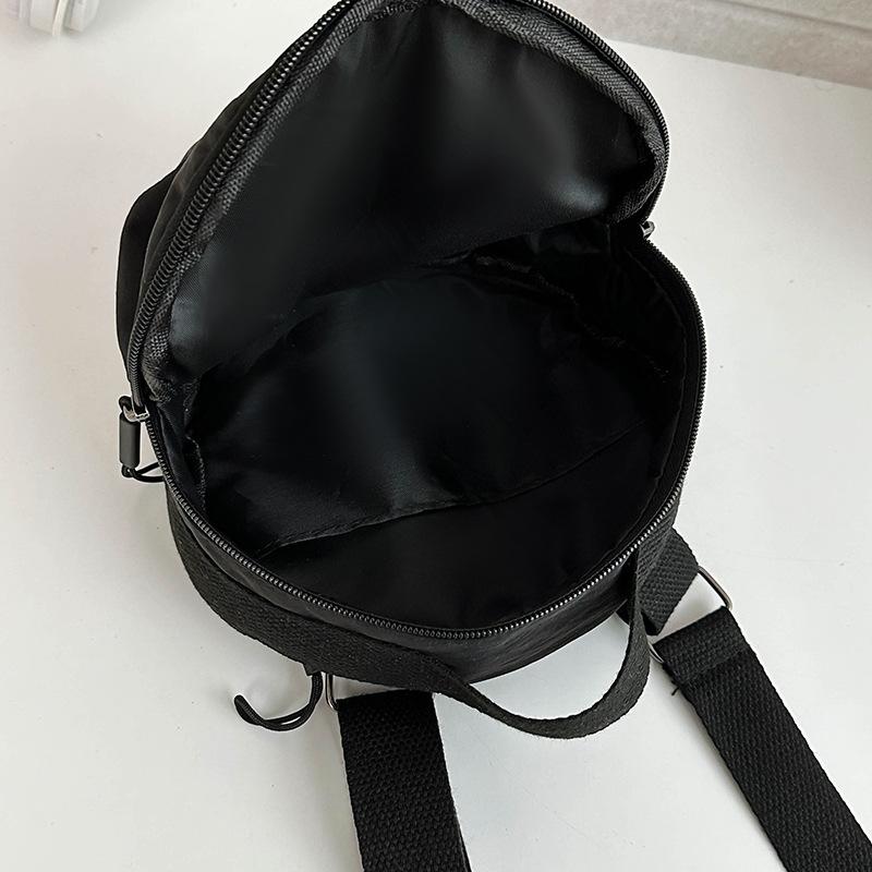 Neue kleine runde Tasche Handy-Tasche Nylon Vielseitig Einfarbig Einseitige Umhängetasche Leicht und Schlicht Kleine Umhängetasche