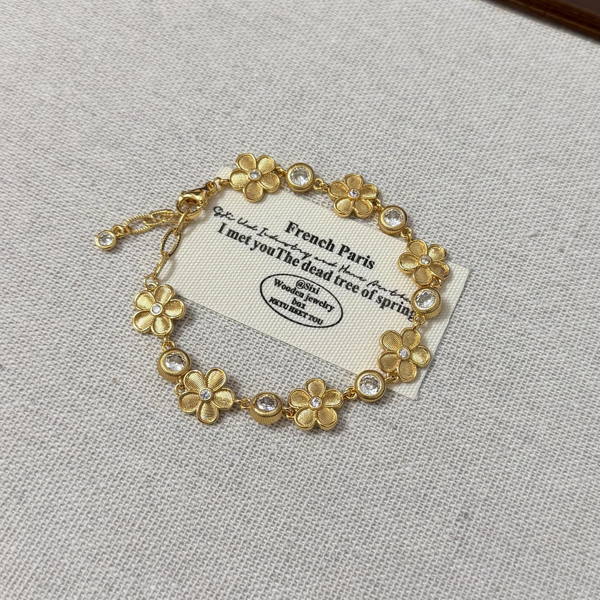 Бестселлер «Сяохуншу»: Браслет с золотым цветком и бриллиантовыми пузырьками в стиле легкой роскоши для женщин