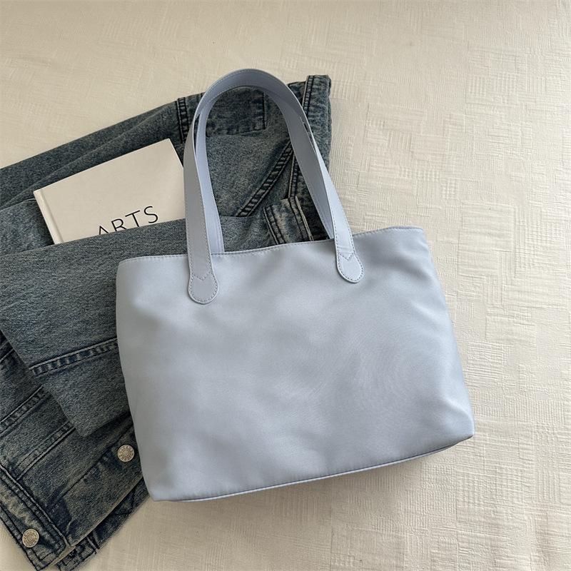 2025 New Fashion Versatile Shopping Bag Large Capacity Handbag Travel Storage Bag Light Commuter Tote Women's Bag