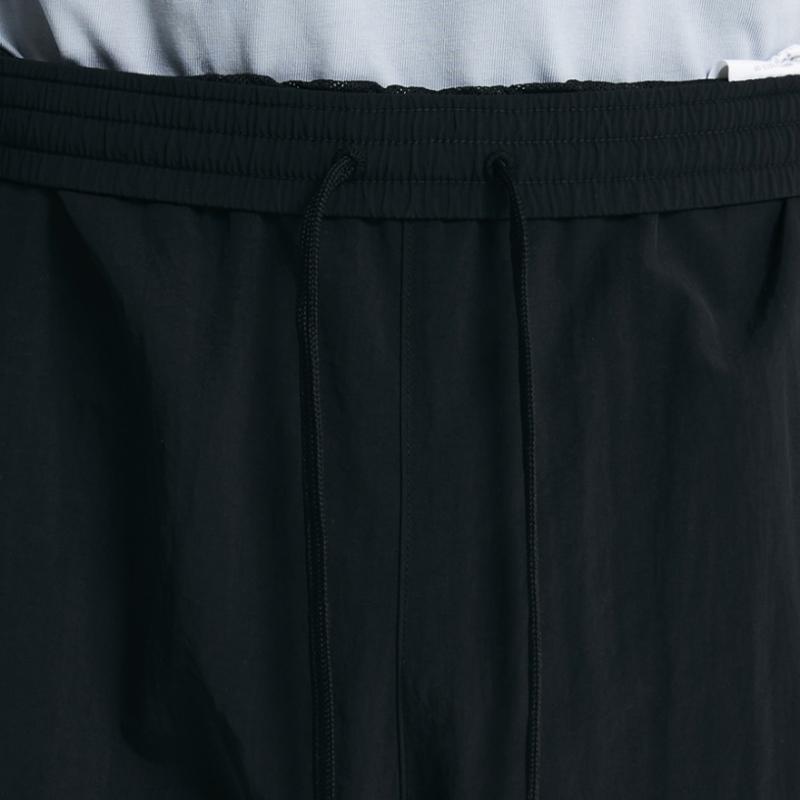 New Balance Nbnte11013 Uni Ess Heritage Woven Straight Pants Black