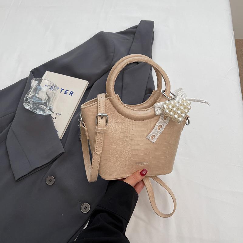 

Shangxin niche ring handbag bag 2025 new Korean version shoulder messenger bag high value fashion bucket bag хаки