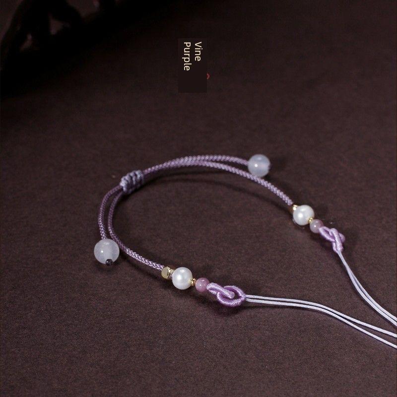 

Плетеный веревочный браслет с кроликом, жемчугом и пряжкой мира Vine Purple