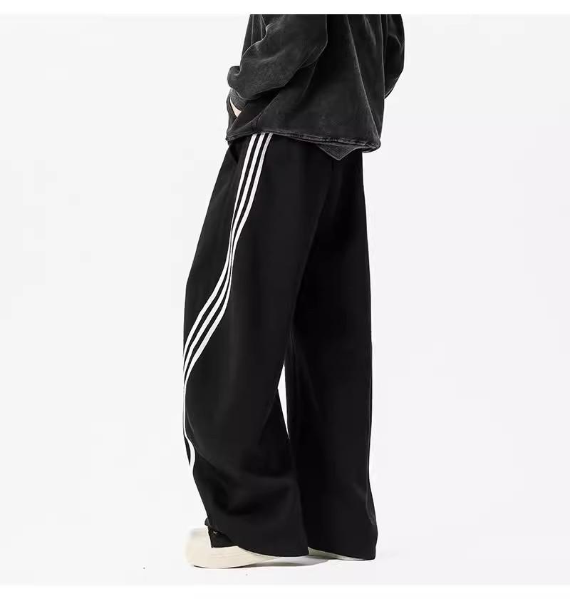 Pánské tmavě modré široké tepláky se třemi pruhy - Ležérní jarní high street trend