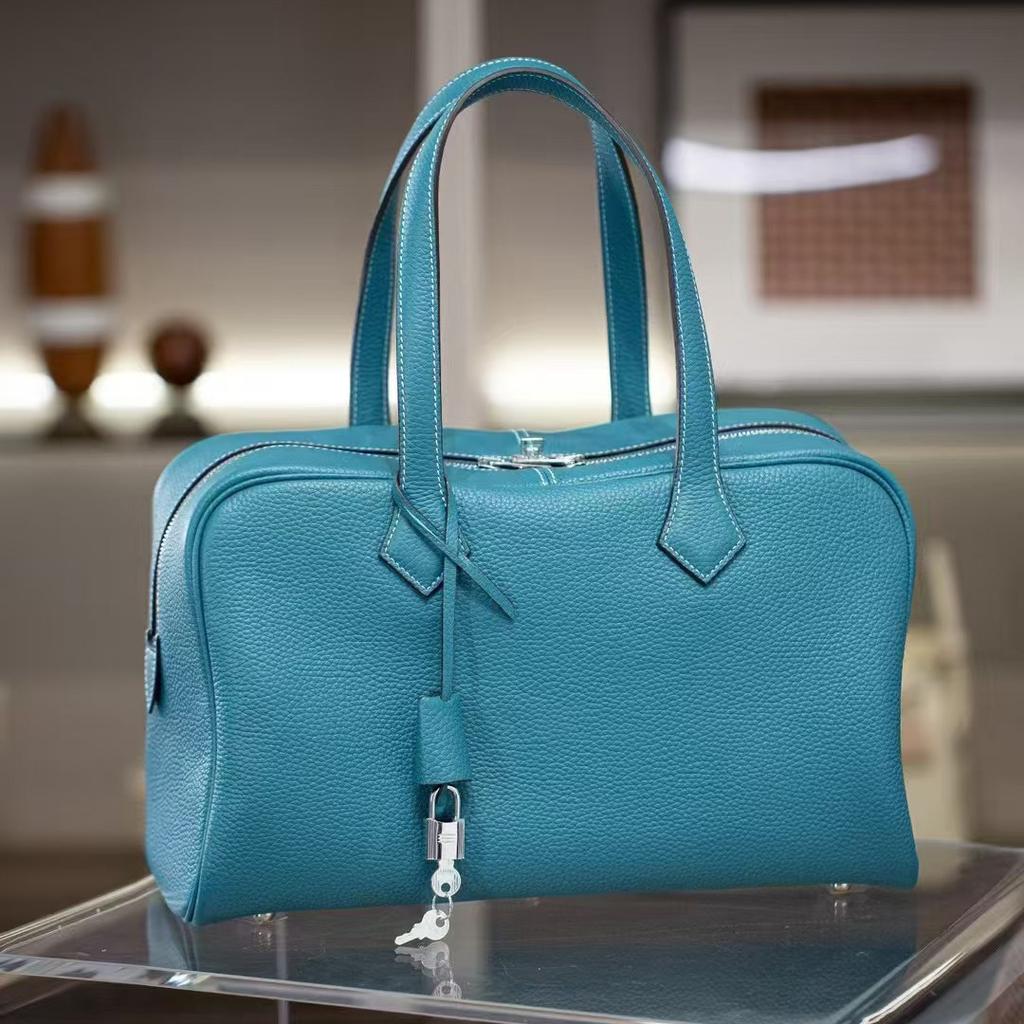 New TC Head Leather Victoria Large Capacity Boston Commuter Handheld Shoulder Bag Cross Border