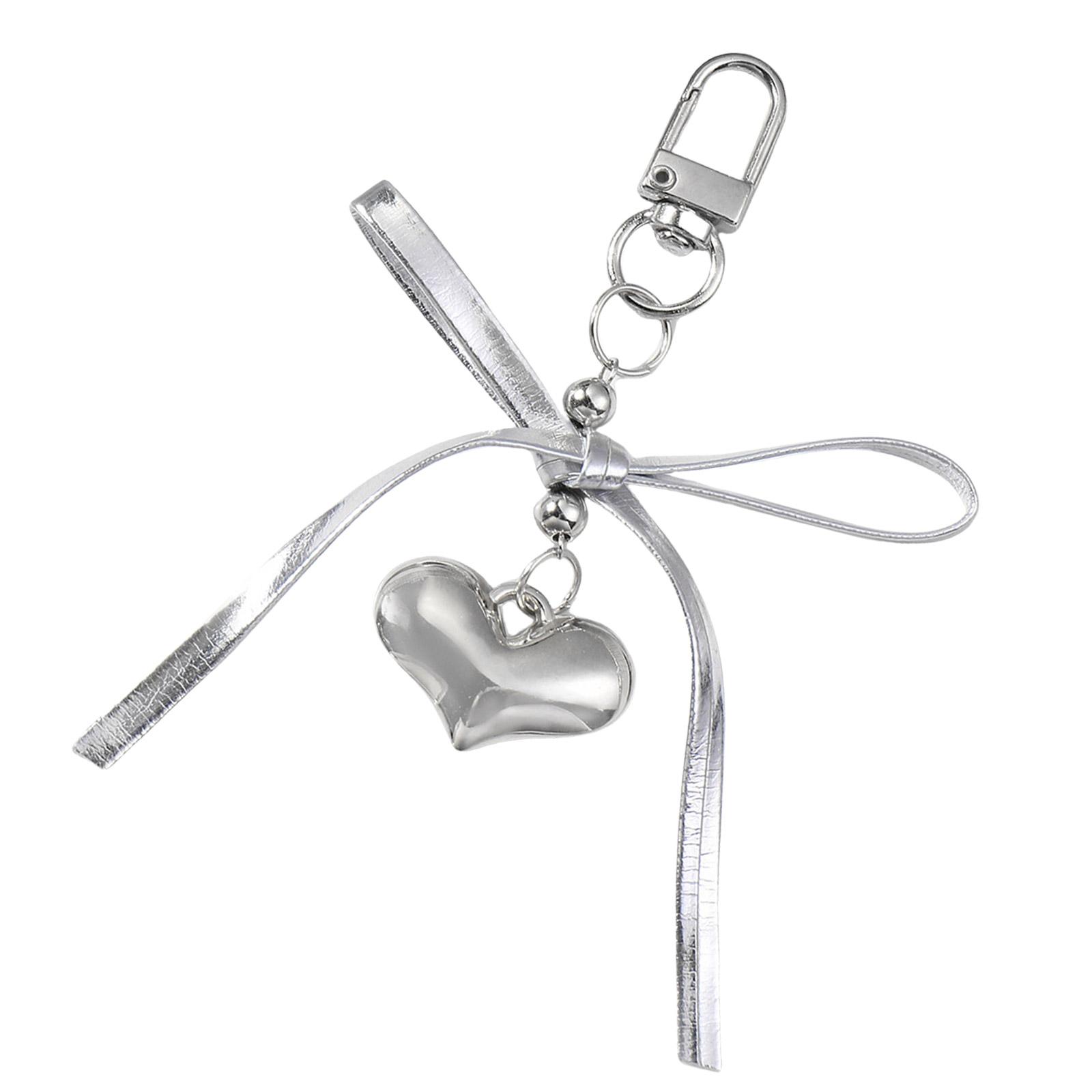 

Elegant Silver Leather Bowknot Key Holder Stylish Accessory with Heart Adornment Key Ornament Suitable for Daily Use