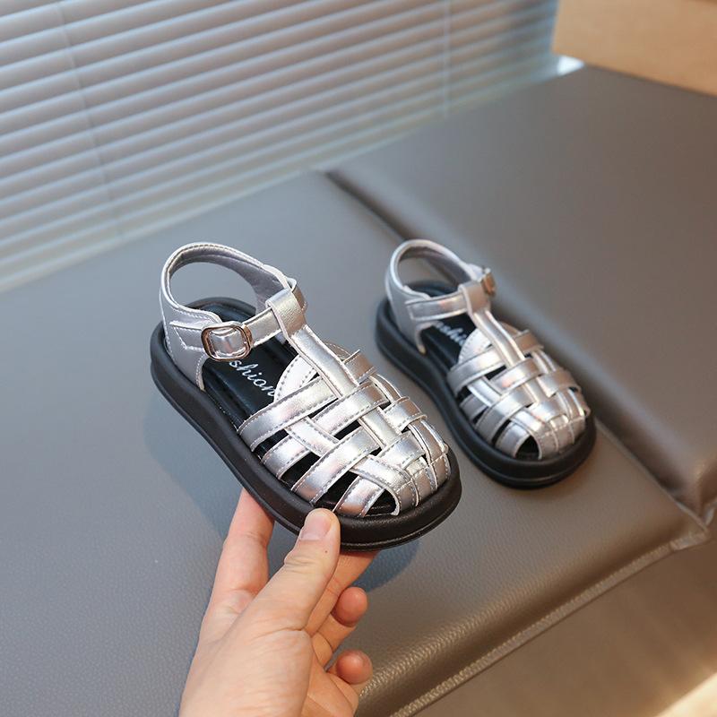 

Children s bag head sandals 2025 summer new children s anti-kick thick-soled hollow Roman shoes girls casual beach shoes 25 серебряный