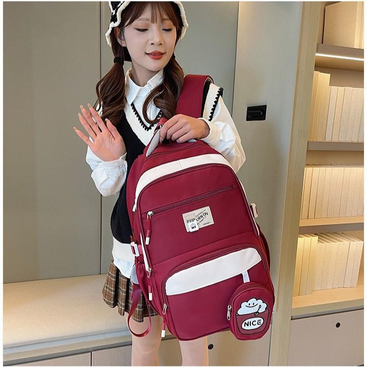 Simple and cute girl burden reduction backpack large size student schoolbag primary and secondary school students large capacity backpack