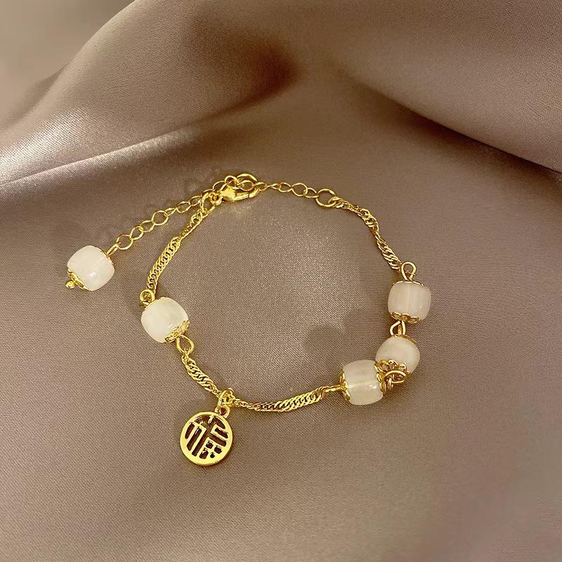

Dream Palace Bell Bracelet: Retro-Inspired, Niche Design, High-End Emotion, Perfect Couple Gift.