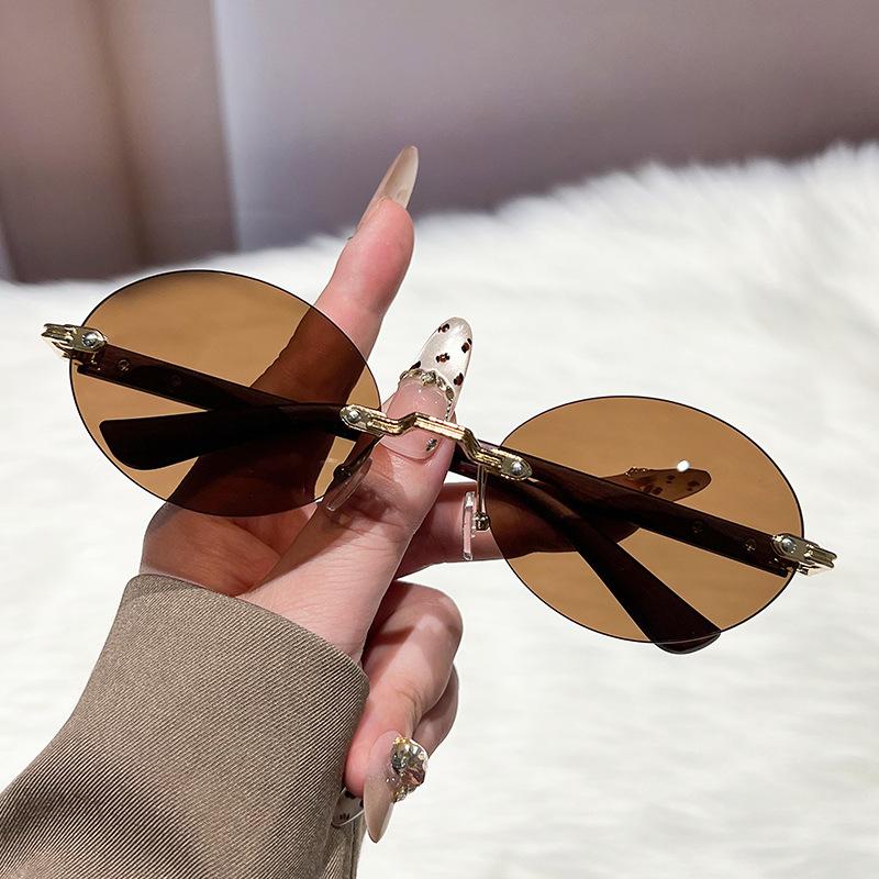 New oval frame sunglasses personalized borderless European and American trend sunglasses concave fashion sunglasses