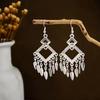 Peacock Tassel Earrings with Hollow Leaf Design in Retro Ethnic Style Imitation Silver for Women