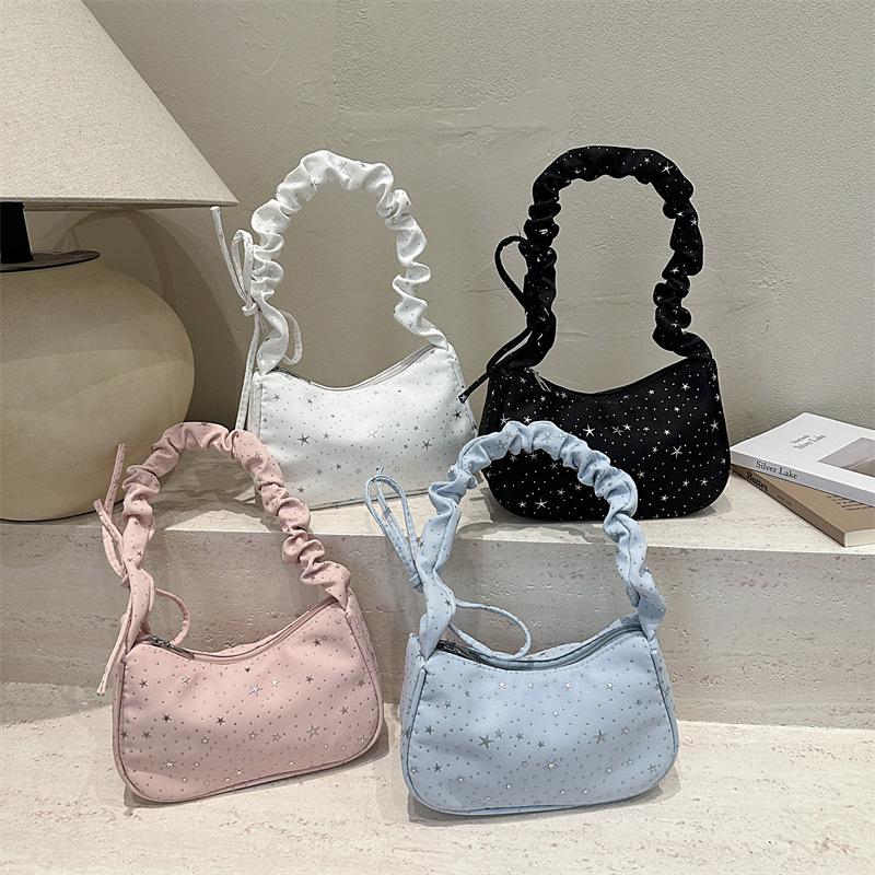 Nischen-Design Stern-Achseltasche Damen neue gefaltete Umhängetasche Pendlertasche High-End vielseitige Canvas-Tasche