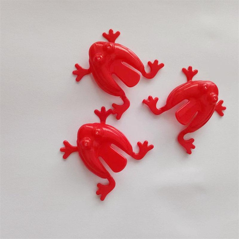 90er-Jahre-Nostalgie: Kleines Hüpfendes Plastikfrosch Spielzeug - Klassischer Retro Hüpfender Frosch für Kinder