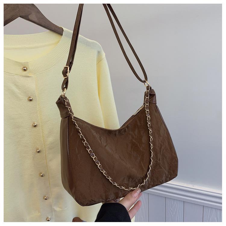 

Solid color personalized trend large capacity women s bag new simple tote crossbody shoulder bag темно-коричневого кольору