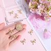 Beebeecraft 1 Box 6Pcs Bowknot Charms 14K Gold Plated 304 Stainless Steel Hollow Bowknot Links with 2 Holes for Necklace Jewelry Making (Hole: 1mm)