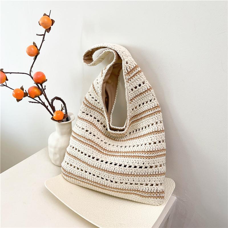 

Повседневная наплечная сумка женская 2025 весна и лето новая соломенная плетеная сумка-ведро с перфорацией большая вместимость сумка подмышку плетеная сумка хаки