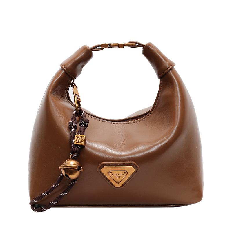 High-end niche bag women's spring retro new fashion messenger bag women's portable work dumpling bag