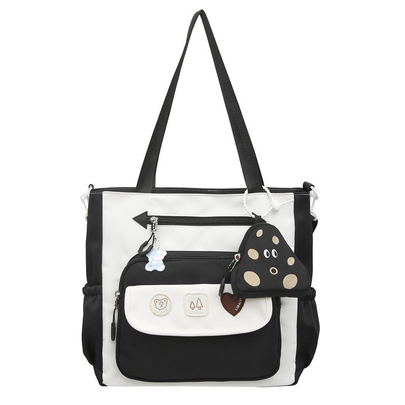 Korean version ins exquisite and cute contrasting colors large-capacity student tutoring bag literary and small fresh women's shoulder messenger bag