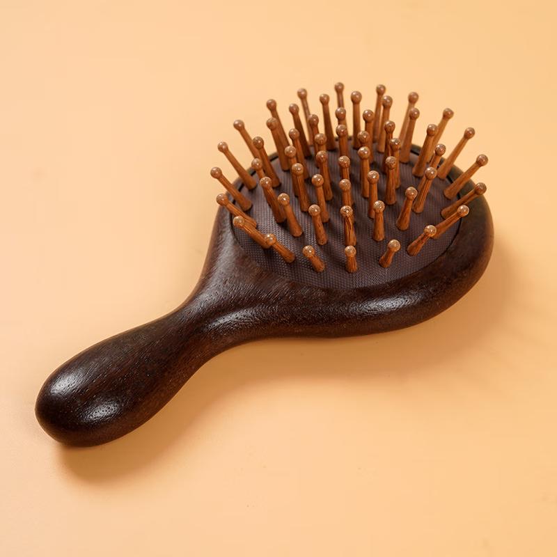 

Erheshen Dragon-Phoenix Sandalwood Air Cushion Massage Comb