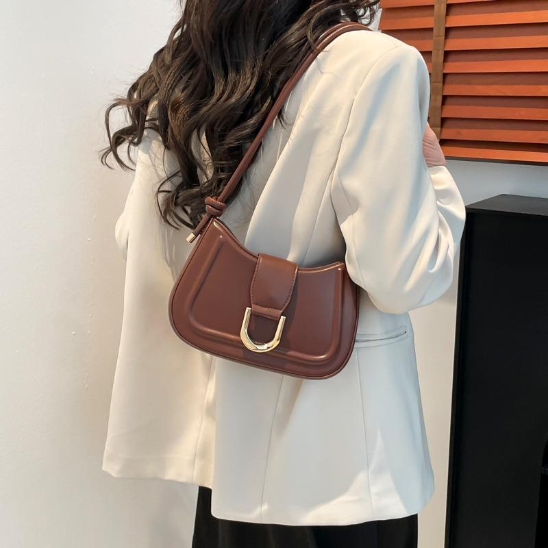 Stylish and simple commuter women's bag spring new armpit bag beautiful portable crossbody niche solid color shoulder bag