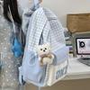 Schoolbag plaid backpack female student schoolbag Korean version large capacity lightweight backpack cute cartoon pain bag new campus bag