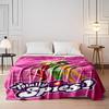 Radial pink lines with white stars behind three colorfully dressed figures. for all seasons blanket lunch break throw gift