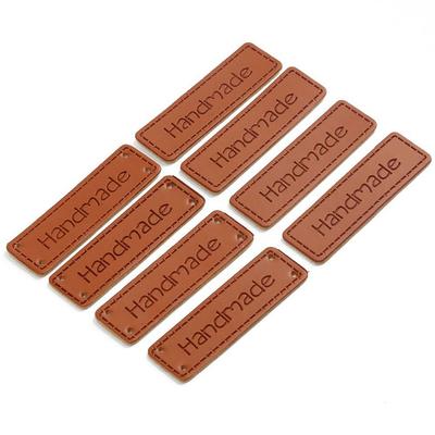 50pcs 1x4cm Embossed Letter Garment Bags Accessories DIY Labels Handmade Pattern PU Leather Tags Sewing Accessory