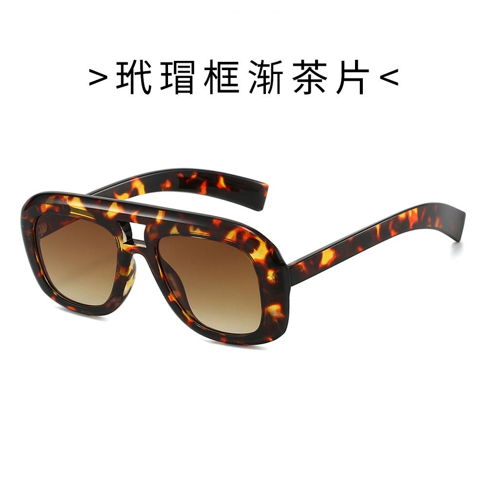 Large-frame, double-bridge, minimalist sunglasses for outdoor use and sun protection during vacations