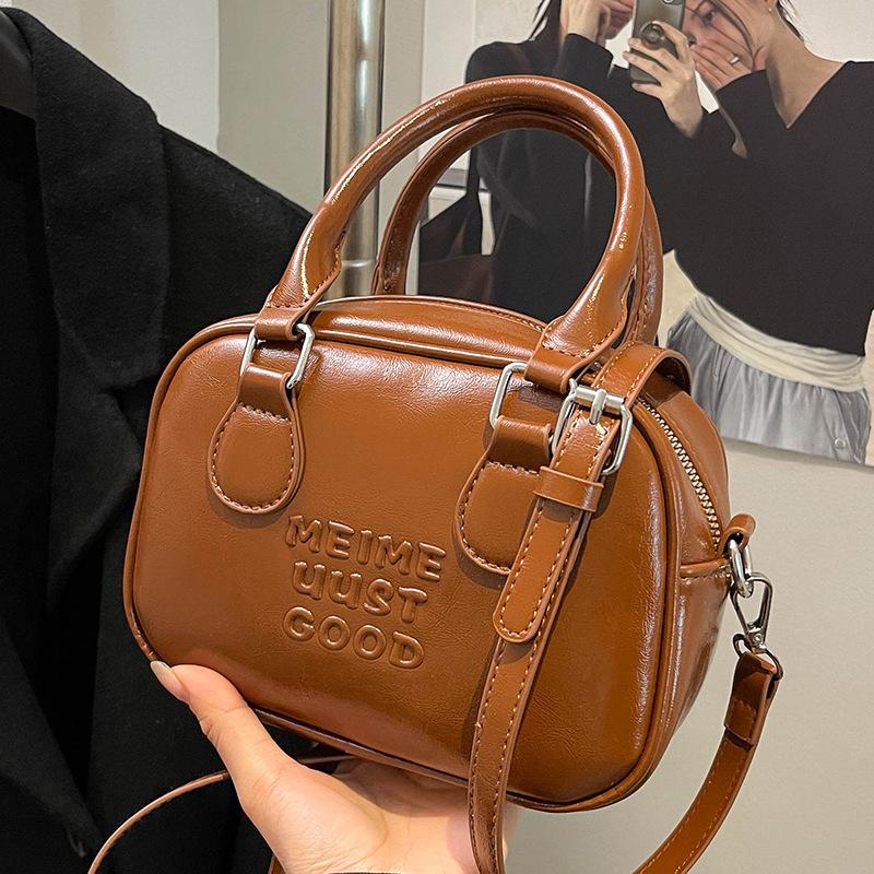 Spring and Summer Popular Korean Niche High-end Portable Bowling Bag Casual Versatile Temperament Foreign Style Messenger Women's Bag