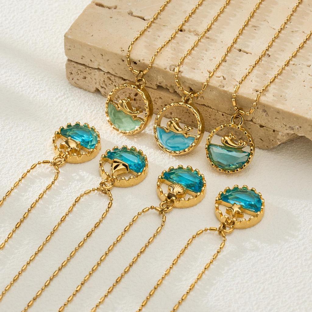 Ocean Series: 18K Gold-Plated Whale & Starfish Pendant Necklace.