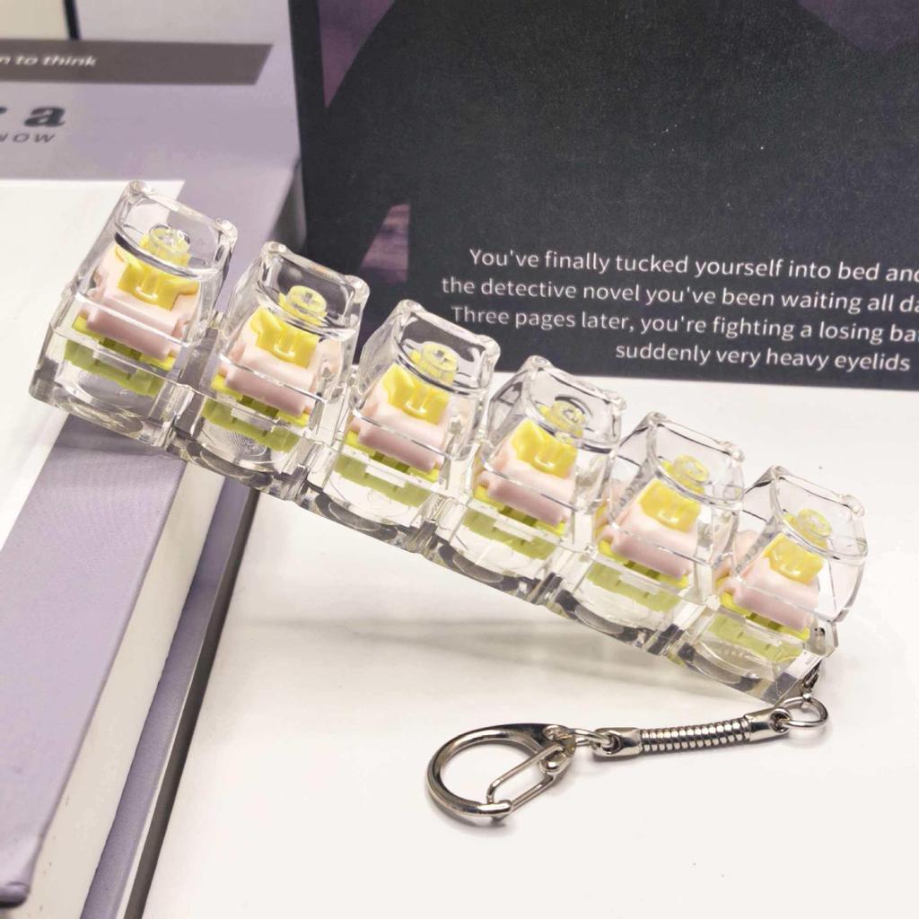 Stummer mechanischer Tastatur-Schlüsselanhänger mit 5,6 Kreuzachsen-Tasten und hochtransparenten Tastenkappen; Dekompression Spielzeug.