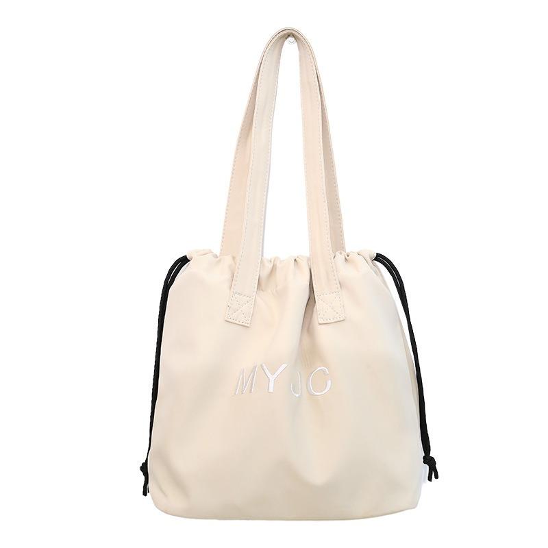 Large-capacity bag women's new summer versatile shoulder bag drawstring lazy wind college student class bag