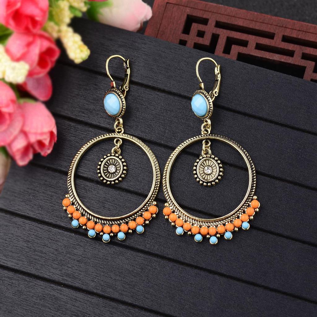 Yunnan Ethnic Bohemian Feather Earrings - Exaggerated No-Pierce Clips for Women