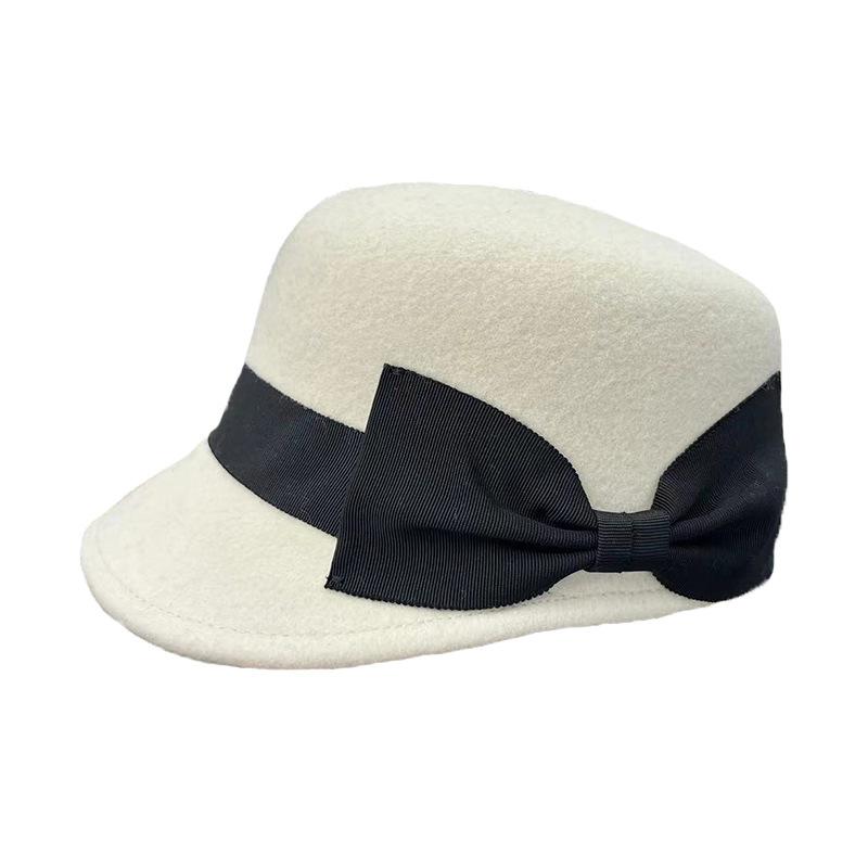 Japan autumn and winter new woolen hat bow women's retro casual equestrian hat peaked hat fashion knight hat