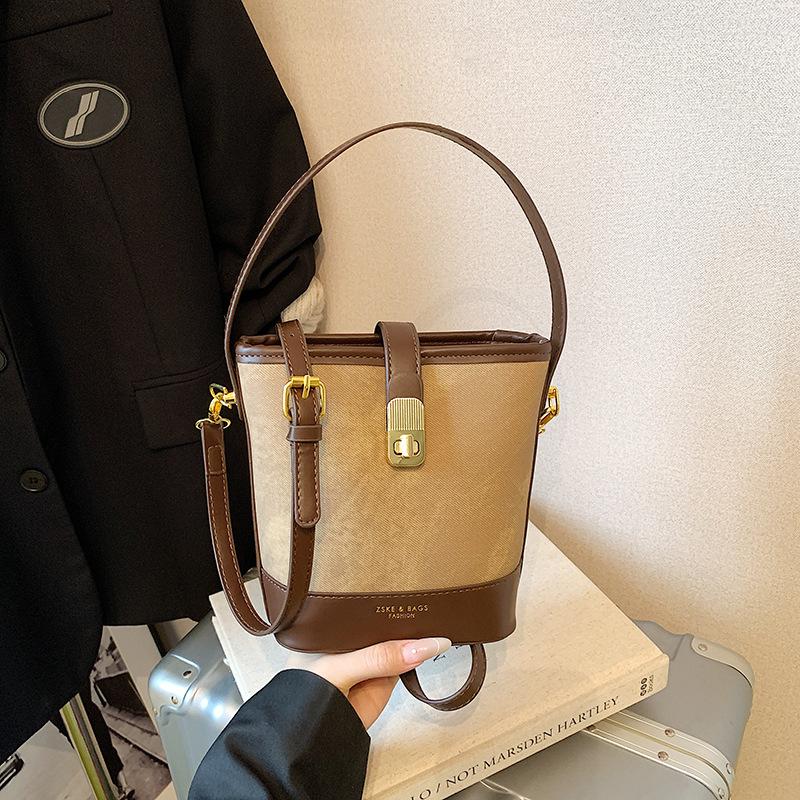 Retro casual texture contrasting color bucket bag 2025 autumn and winter new fashionable versatile simple portable shoulder messenger bag