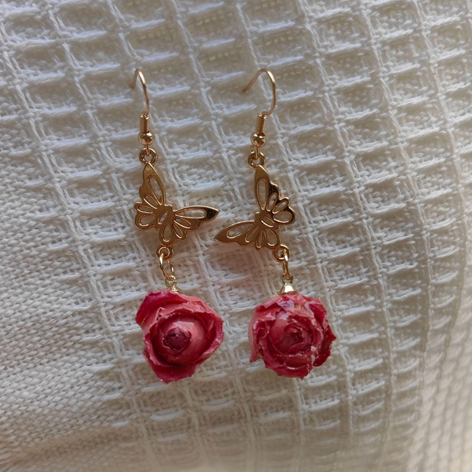Handmade Retro Tassel Earrings with Preserved Red Rose Design