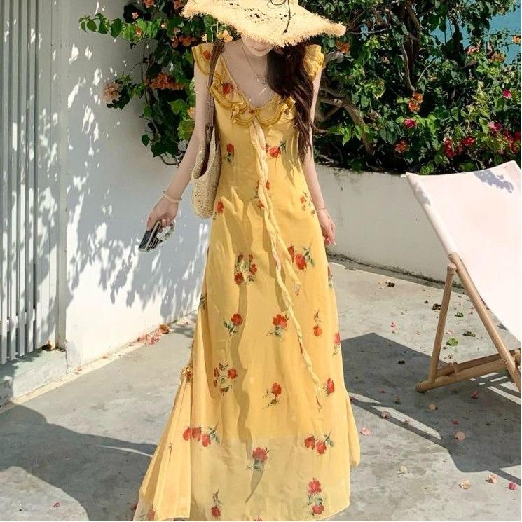 Seaside vacation style temperament waist beautiful long dress women's summer new French coffee break yellow floral dress