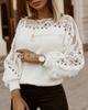 Hollow pattern splicing lantern sleeve sweater