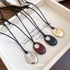 Spray-Painted Oval Openwork Pendant Necklace - Elegant, Versatile Clavicle Chain for Women